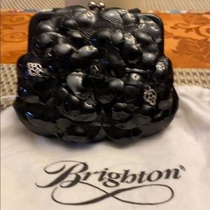 Brighton’s leather flower evening and holiday bag